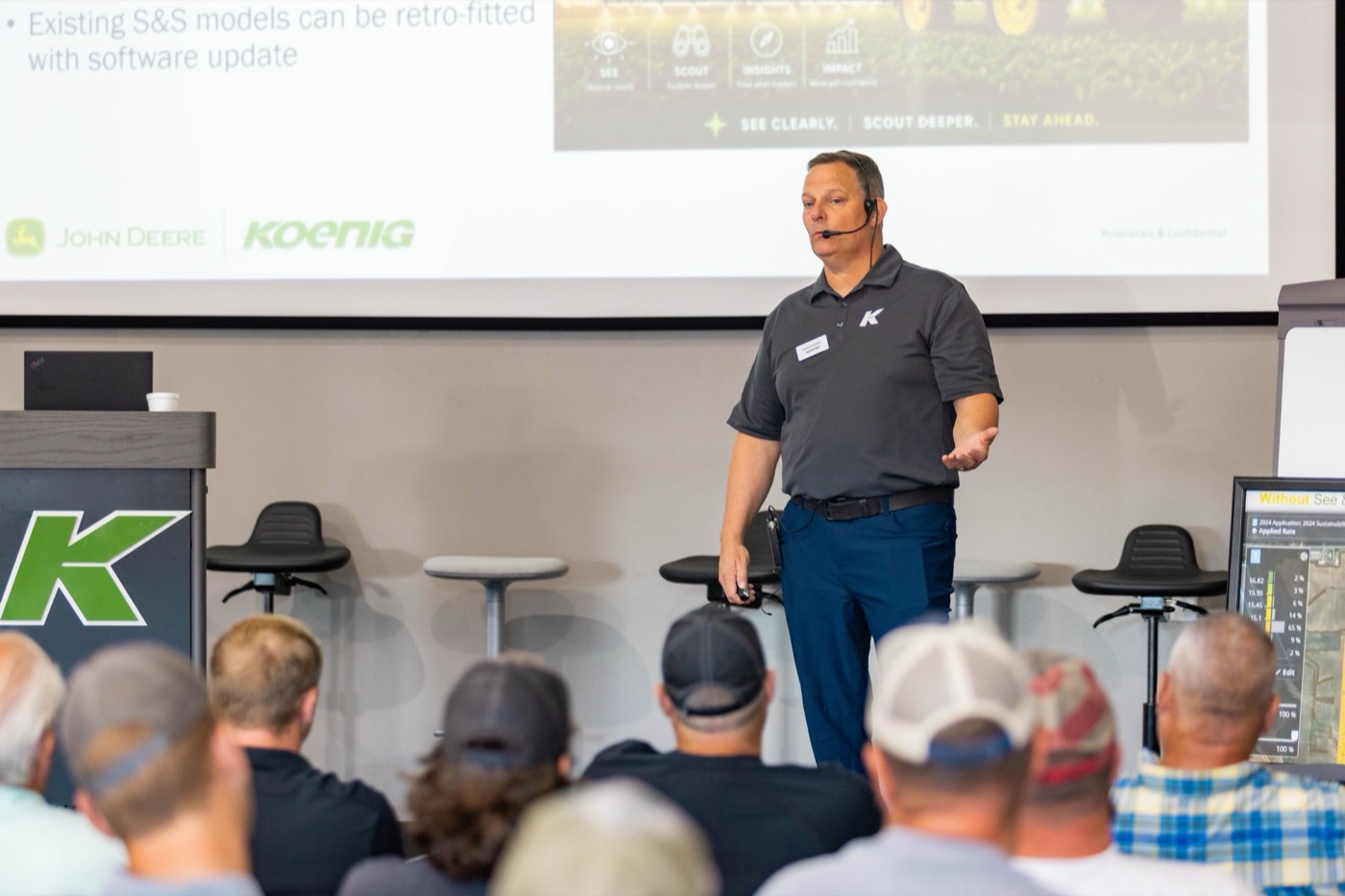A Koenig Equipment presenter leading a John Deere See & Spray technology session
